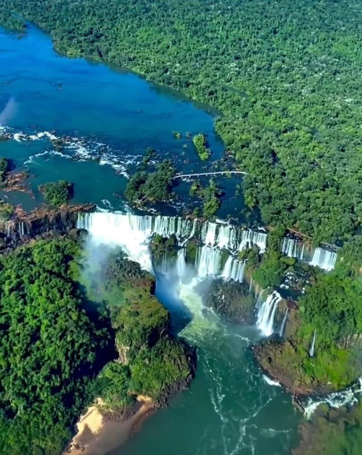 Aerial view of Iguazú Falls and the surrounding rainforest